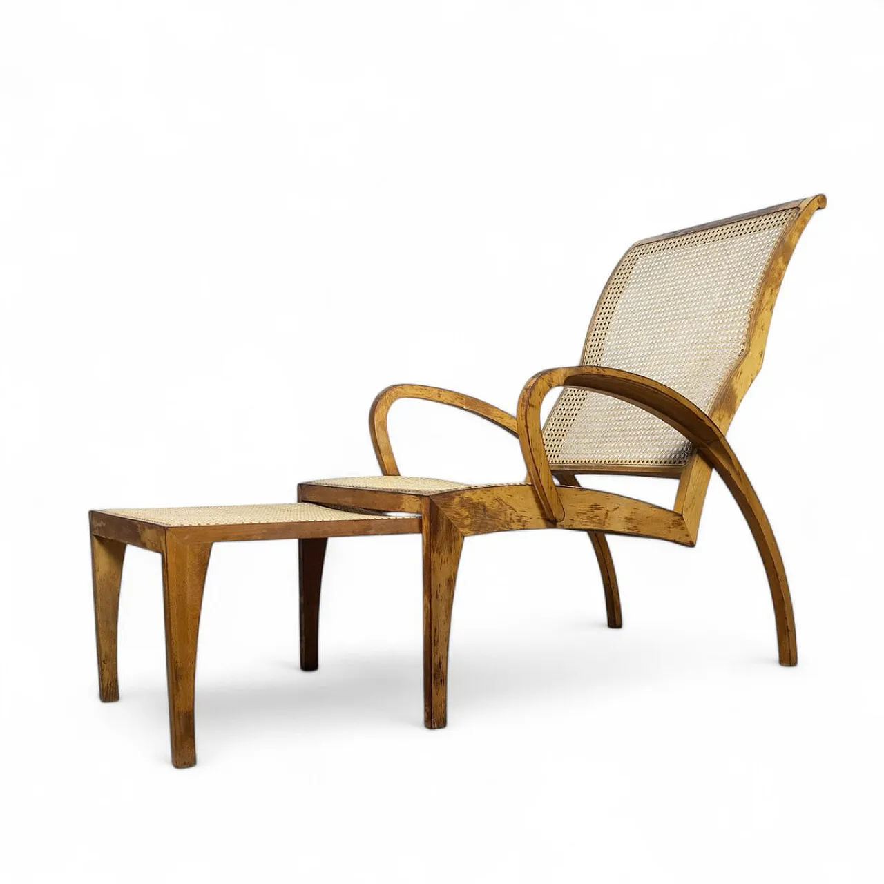 Modernist sculptural cane lounge chair with ottoman, 1940s 1