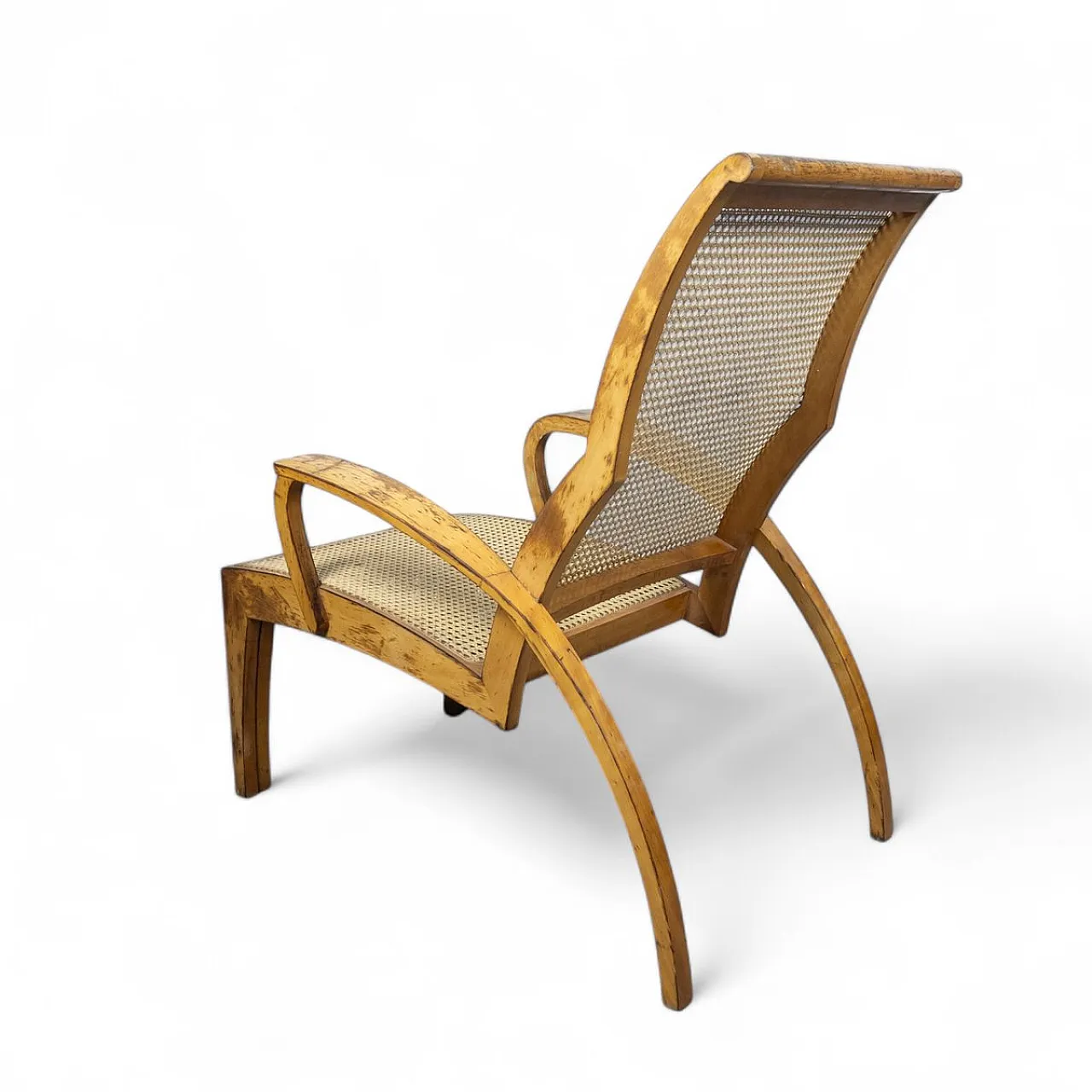Modernist sculptural cane lounge chair with ottoman, 1940s 12