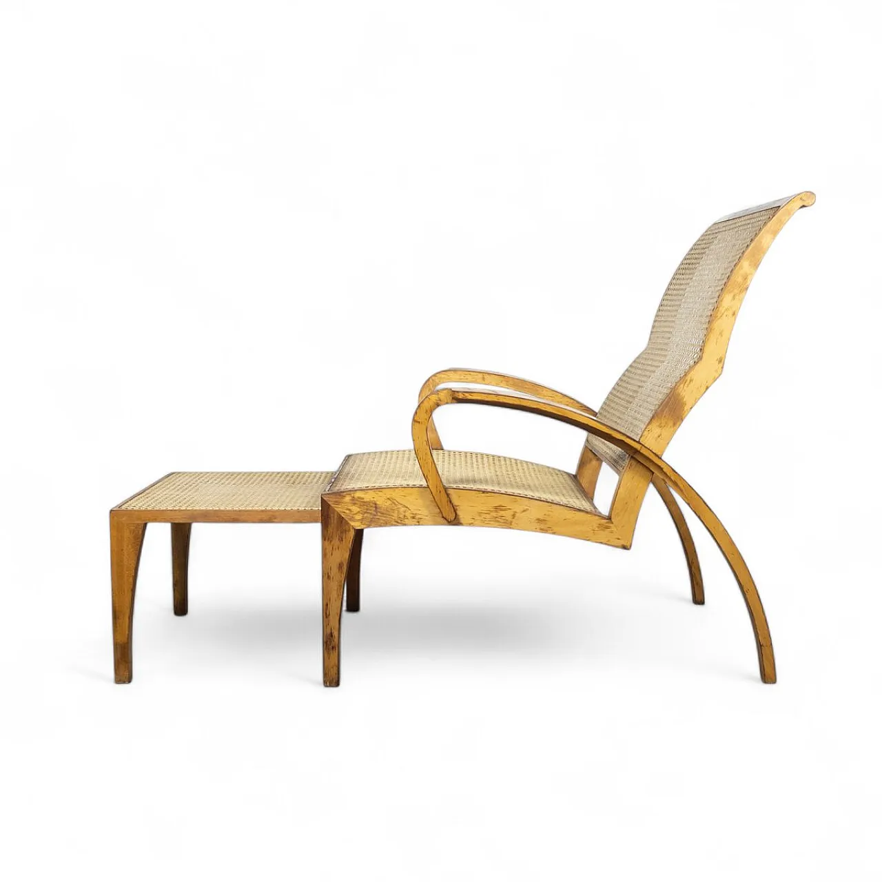 Modernist sculptural cane lounge chair with ottoman, 1940s 13