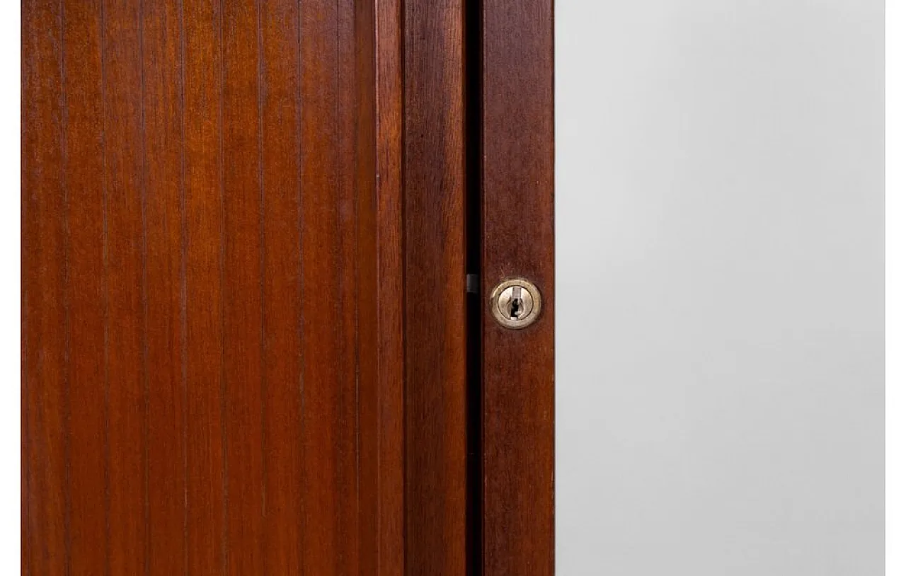 Wooden cabinet with sliding roll-top door and adjustable shelves, 1950 11