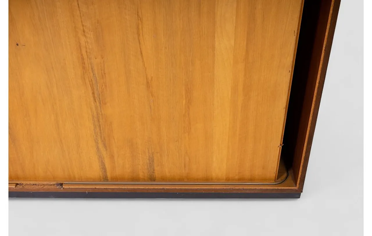 Wooden cabinet with sliding roll-top door and adjustable shelves, 1950 12
