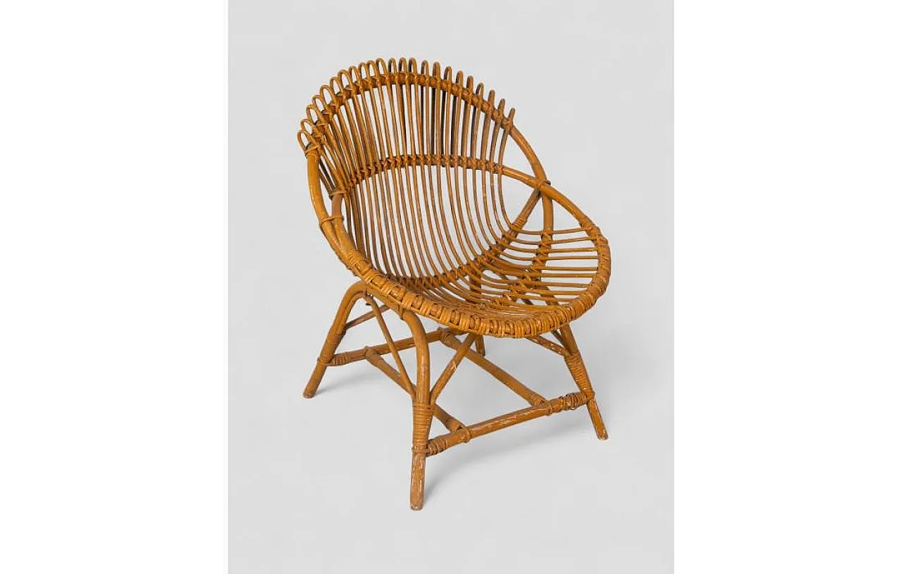 Curved shell armchair in rattan, 1970s 3