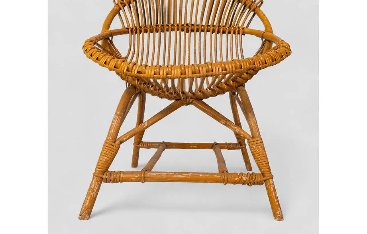Curved shell armchair in rattan, 1970s 8