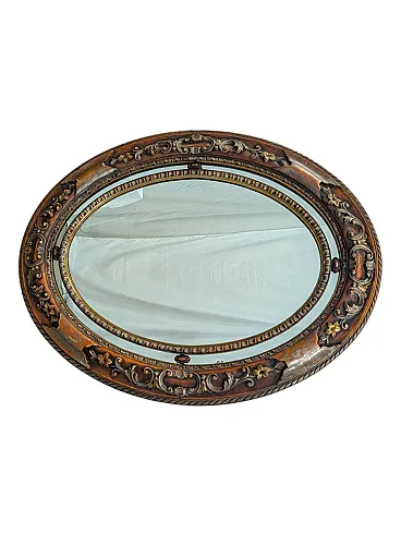 Oval mirror with carved wood frame, 1980s