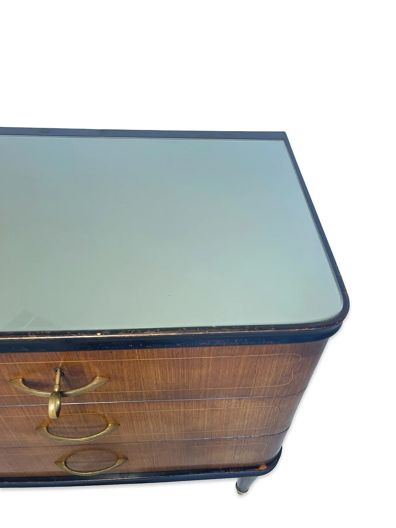 Veneered mahogany chest of drawers with green glass top, 1950s. 36