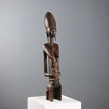 Wooden sculpture depicting a mother, 20th century