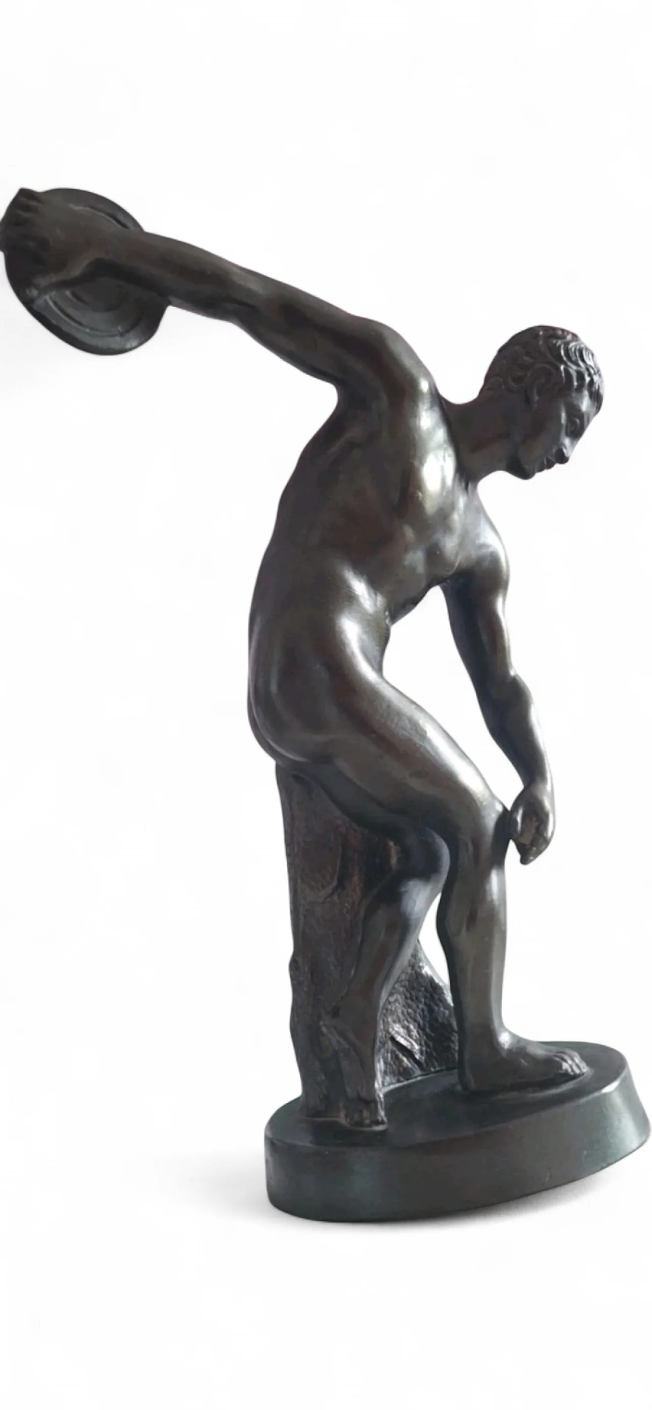 Ancient sculpture of a Discopolo di Mirone in burnished metal on a marble base 9