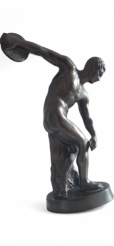 Ancient sculpture of a Discopolo di Mirone in burnished metal on a marble base