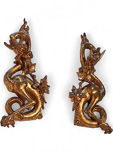 Pair of decorative elements in the shape of winged dragons, 19th c.