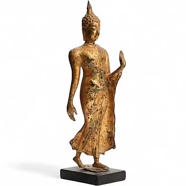 Gilt-bronze figure of the Walking Buddha, 19th century