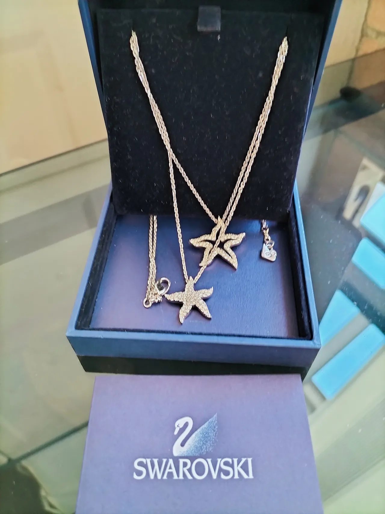 Metal and crystal necklace with starfish pendants by Swarovski, 2000s 1
