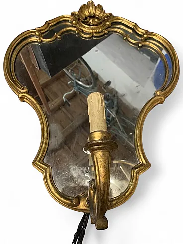 Carved wooden wall lamp with mercury mirror and gold gilding, Italy, 1960s