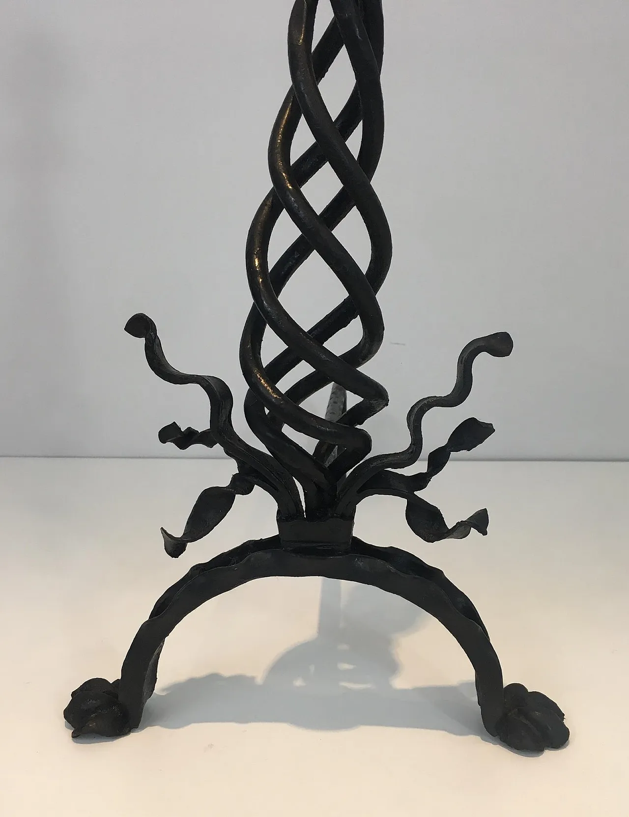 Pair of twisted wrought iron andirons with finials, French, 20s 8