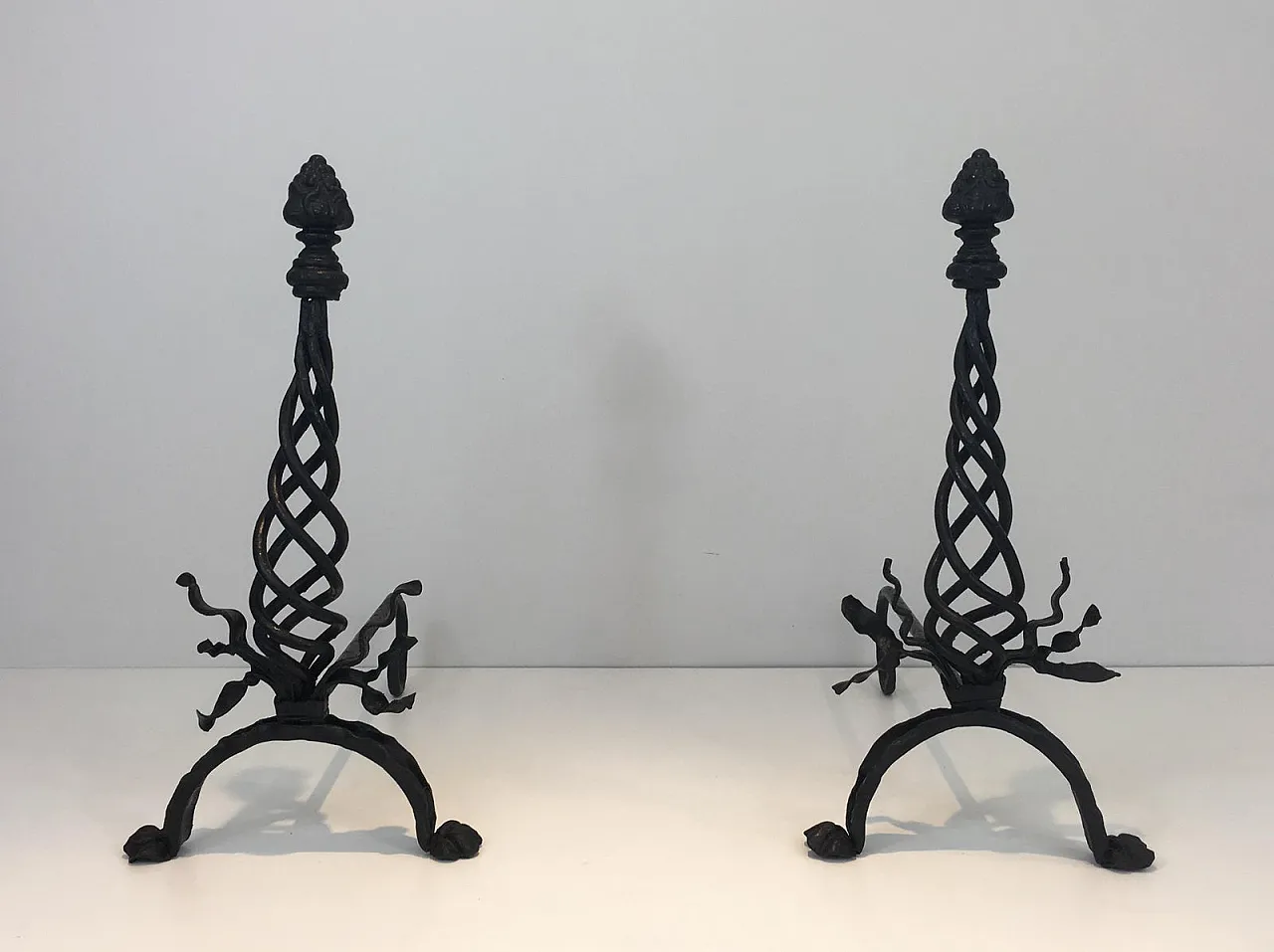 Pair of twisted wrought iron andirons with finials, French, 20s 12