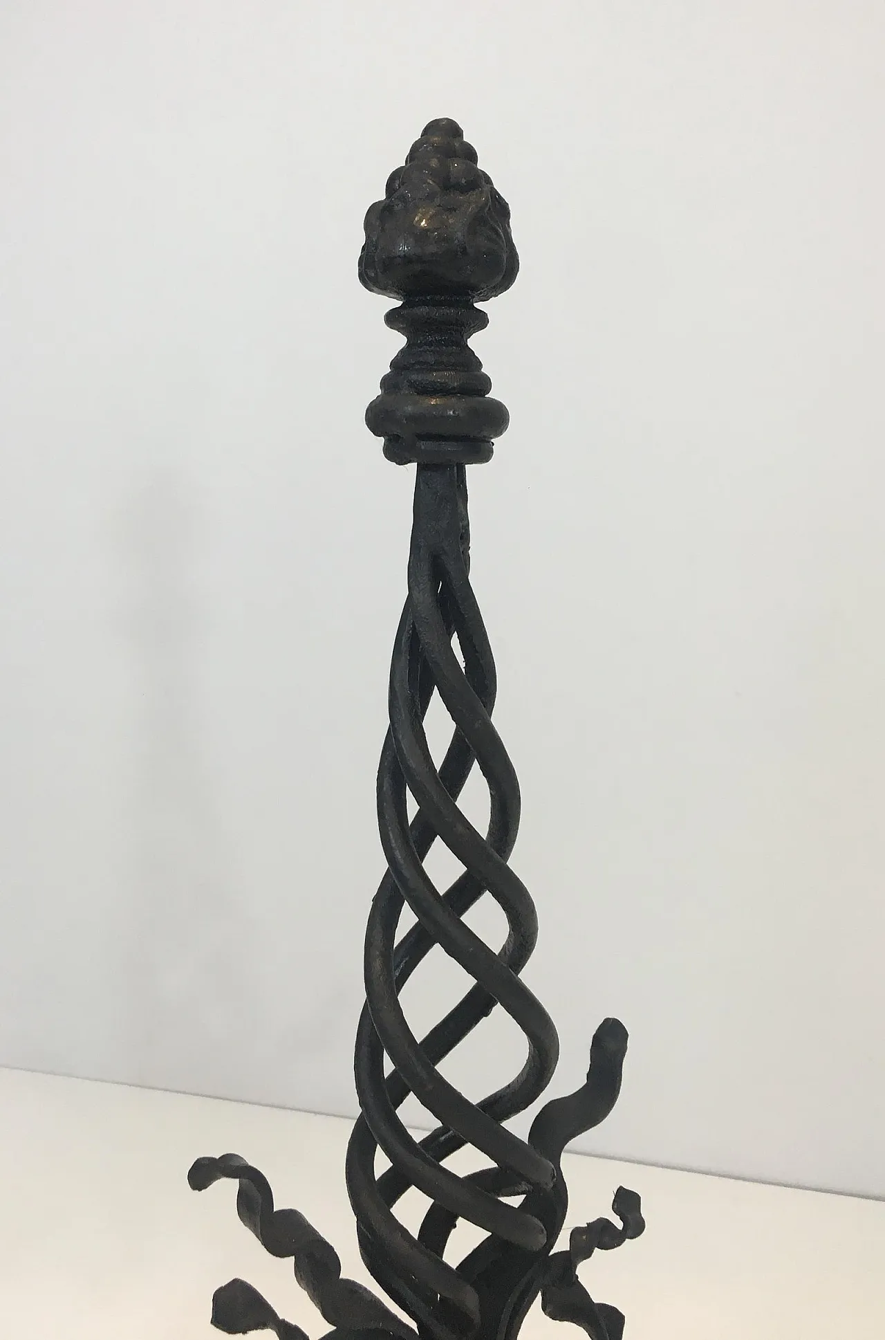 Pair of twisted wrought iron andirons with finials, French, 20s 13