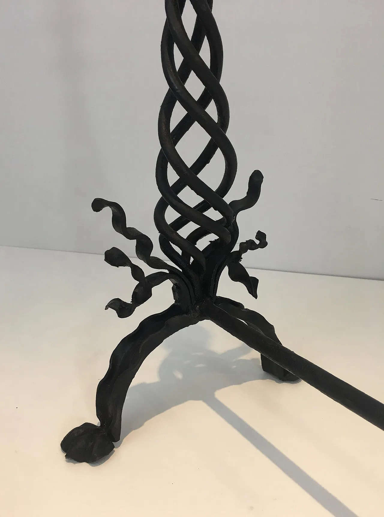 Pair of twisted wrought iron andirons with finials, French, 20s 15