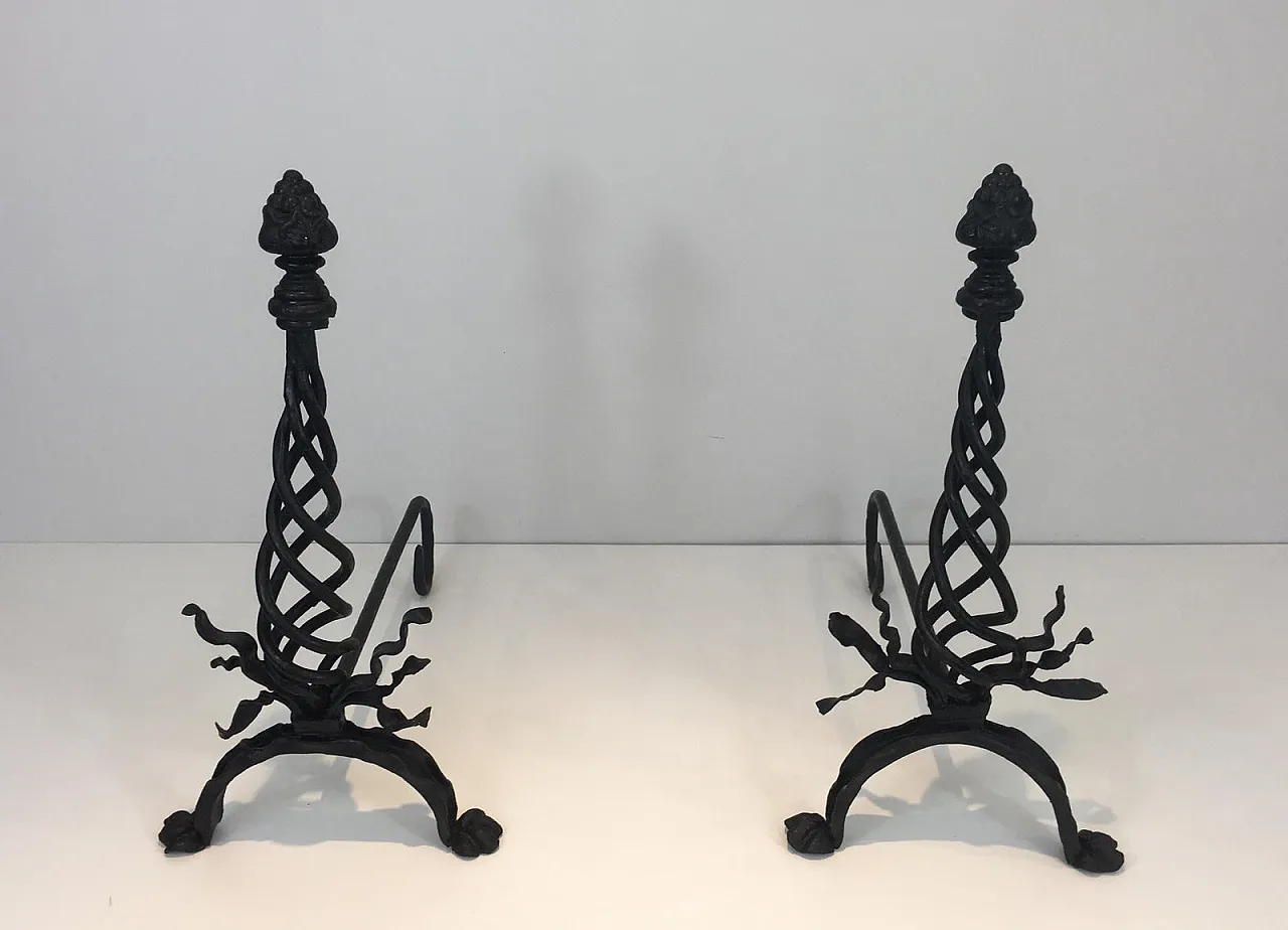 Pair of twisted wrought iron andirons with finials, French, 20s 17