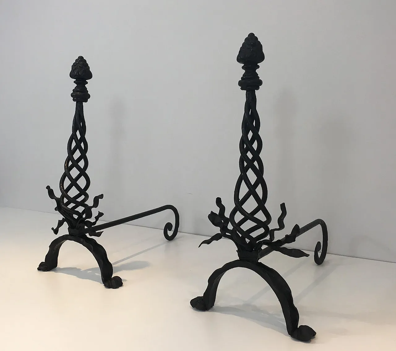 Pair of twisted wrought iron andirons with finials, French, 20s 18