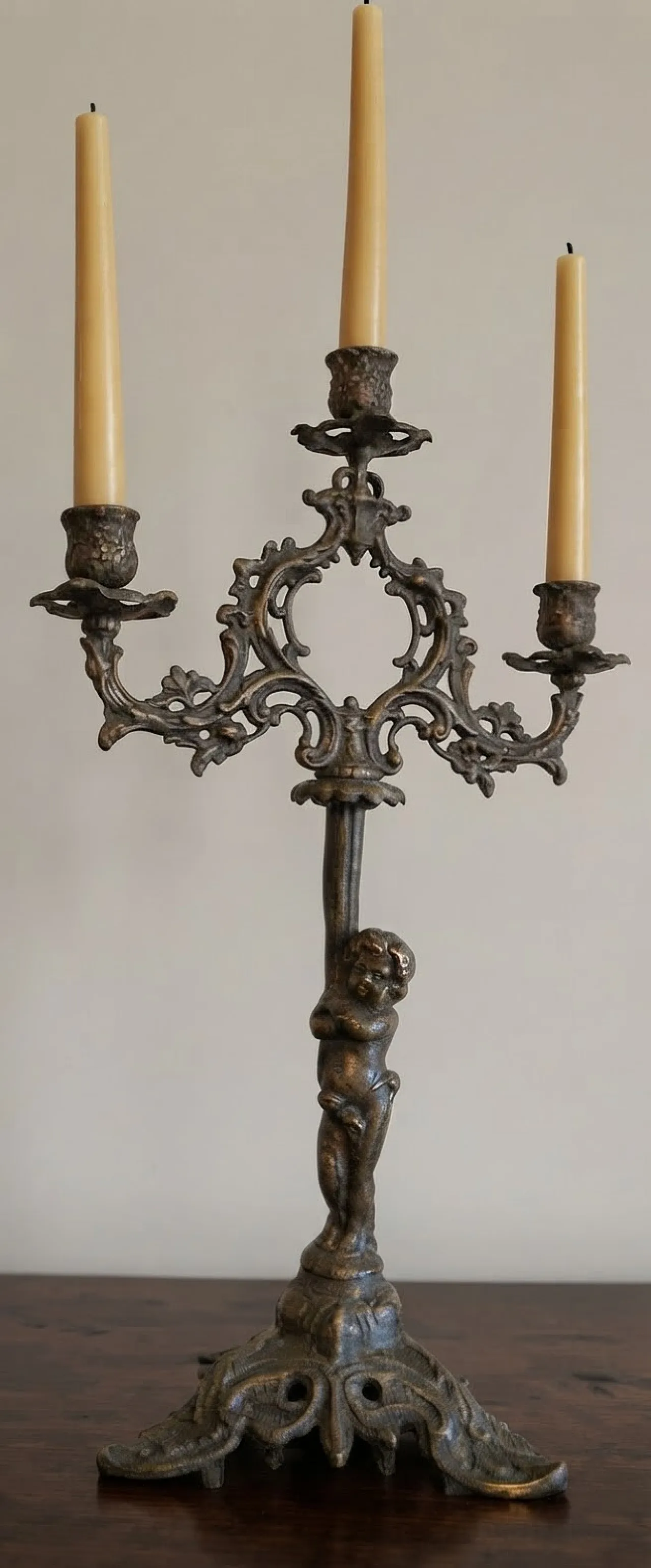 Bronze candle holder with cherub, 19th century 1