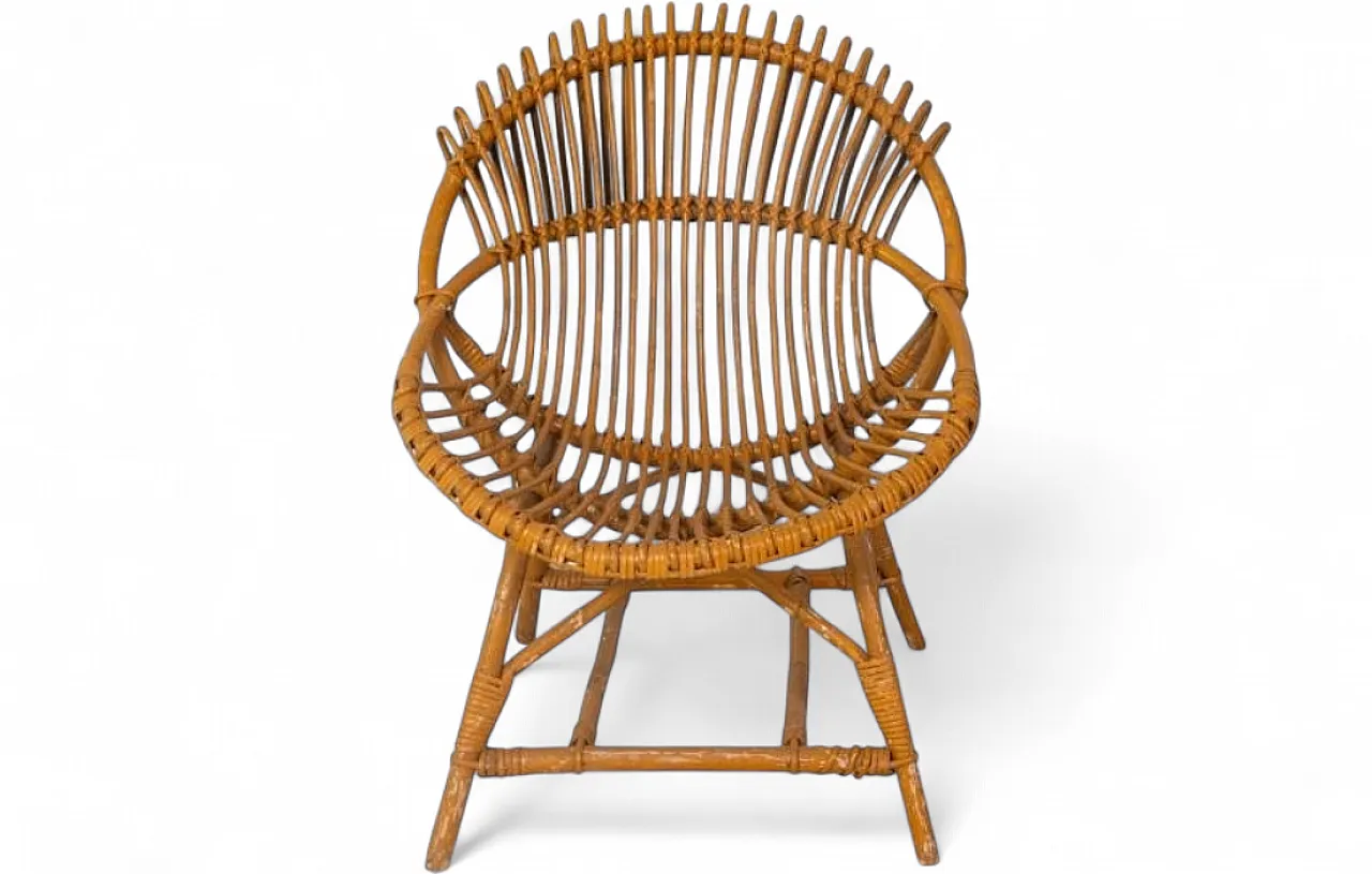Curved shell armchair in rattan, 1970s 9