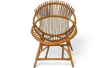 Curved shell armchair in rattan, 1970s