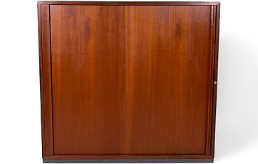 Wooden cabinet with sliding roll-top door and adjustable shelves, 1950