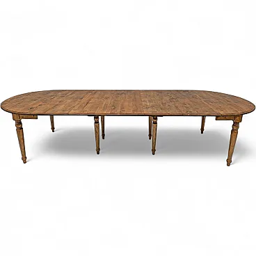Elm extendable round dining table with five leaves, 19th century