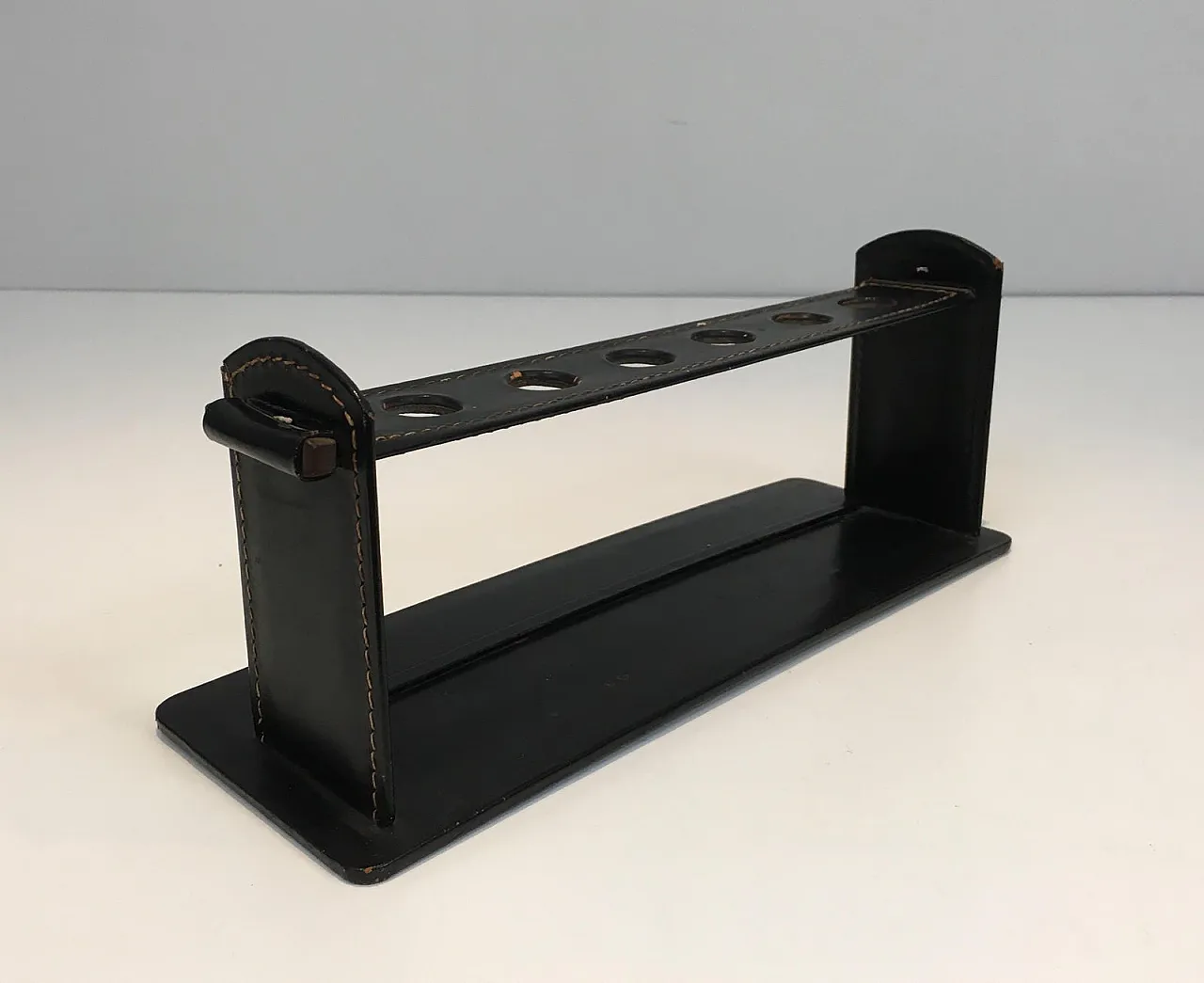 Jacques Adnet, black leather pipe display stand, French, circa 1950 4