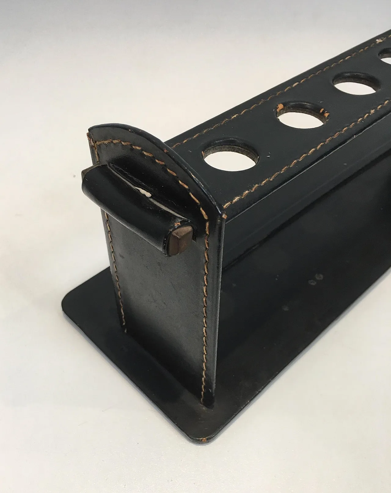Jacques Adnet, black leather pipe display stand, French, circa 1950 5