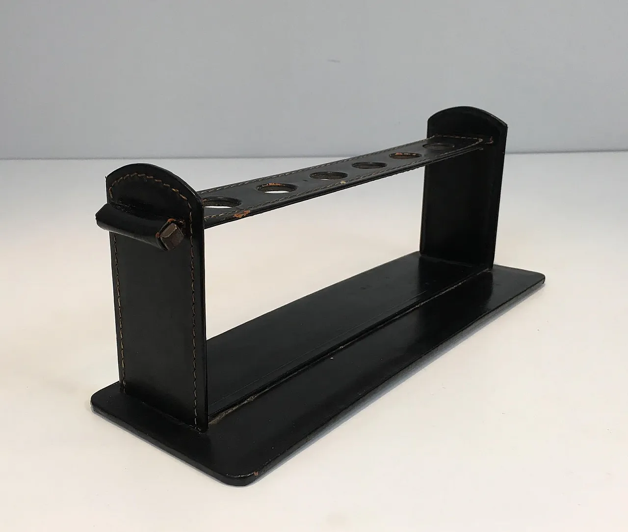 Jacques Adnet, black leather pipe display stand, French, circa 1950 11