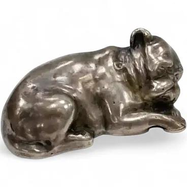 Silver figurine depicting a seated dog, early 20th century