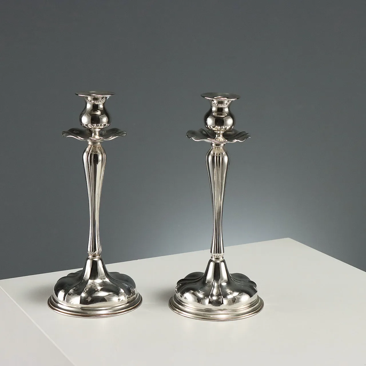 Pair of silver candlesticks by Bellotto, 20th century 1