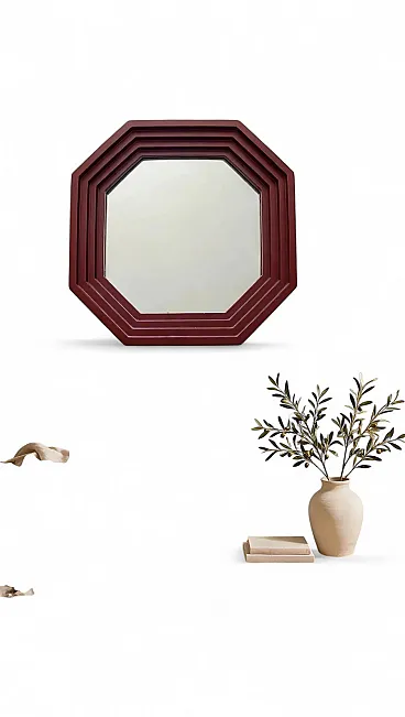 Burgundy octagonal mirror attributed to Carlo de Carli, 1970s